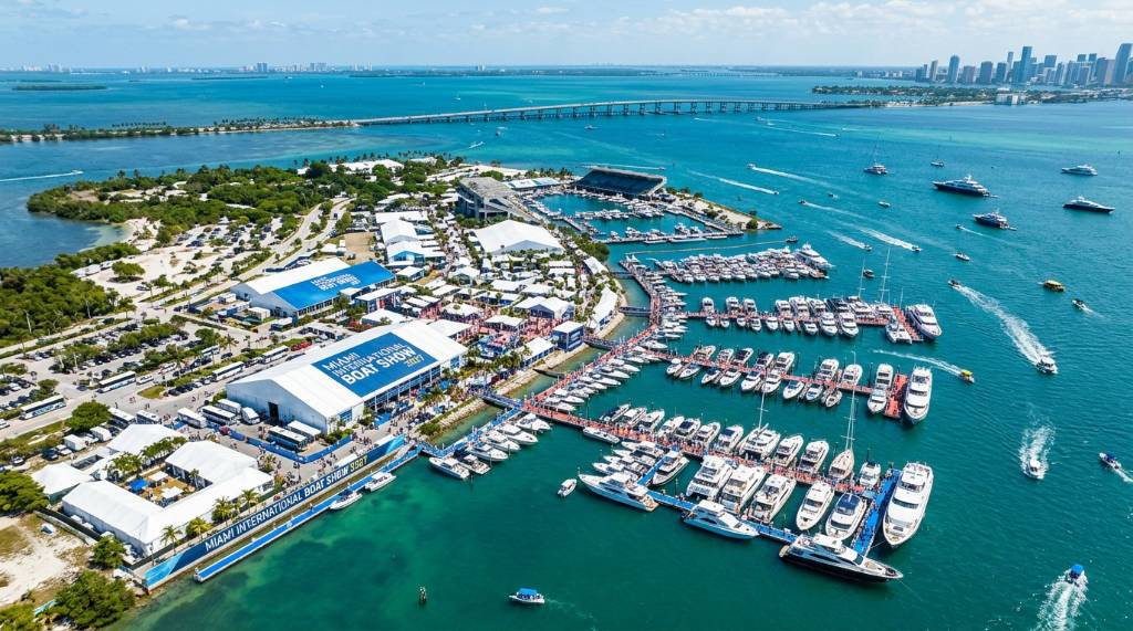 Aerial view of the Miami International Boat Show 2027 at Virginia Key with hundreds of boats docked along Biscayne Bay